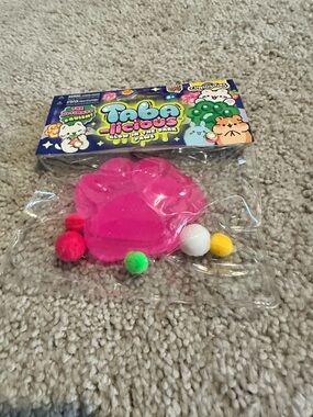 Taba-licious Pink Paw Squishy Toy by Curious Cat Glows In The Dark